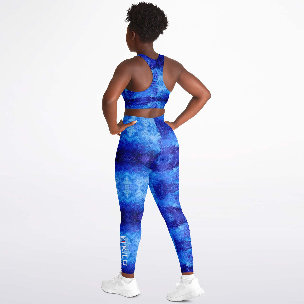 Woman wearing KILO K-Padded Sports Bra & Leggings Set - side back