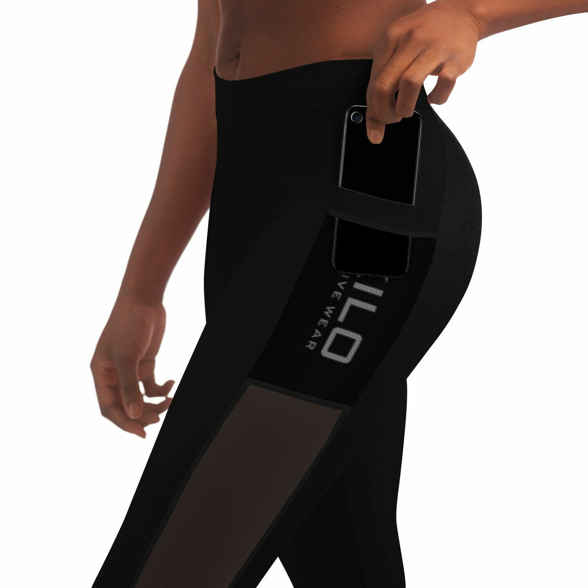 Close-up of woman wearing KILO K-Mesh Pocket Leggings